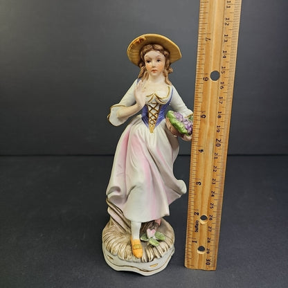 Porcelain Figure of Lady with Basket of Grapes 7"