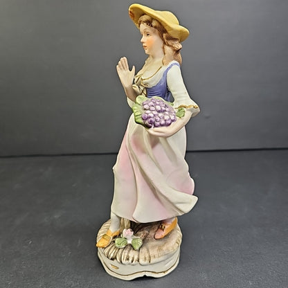 Porcelain Figure of Lady with Basket of Grapes 7"