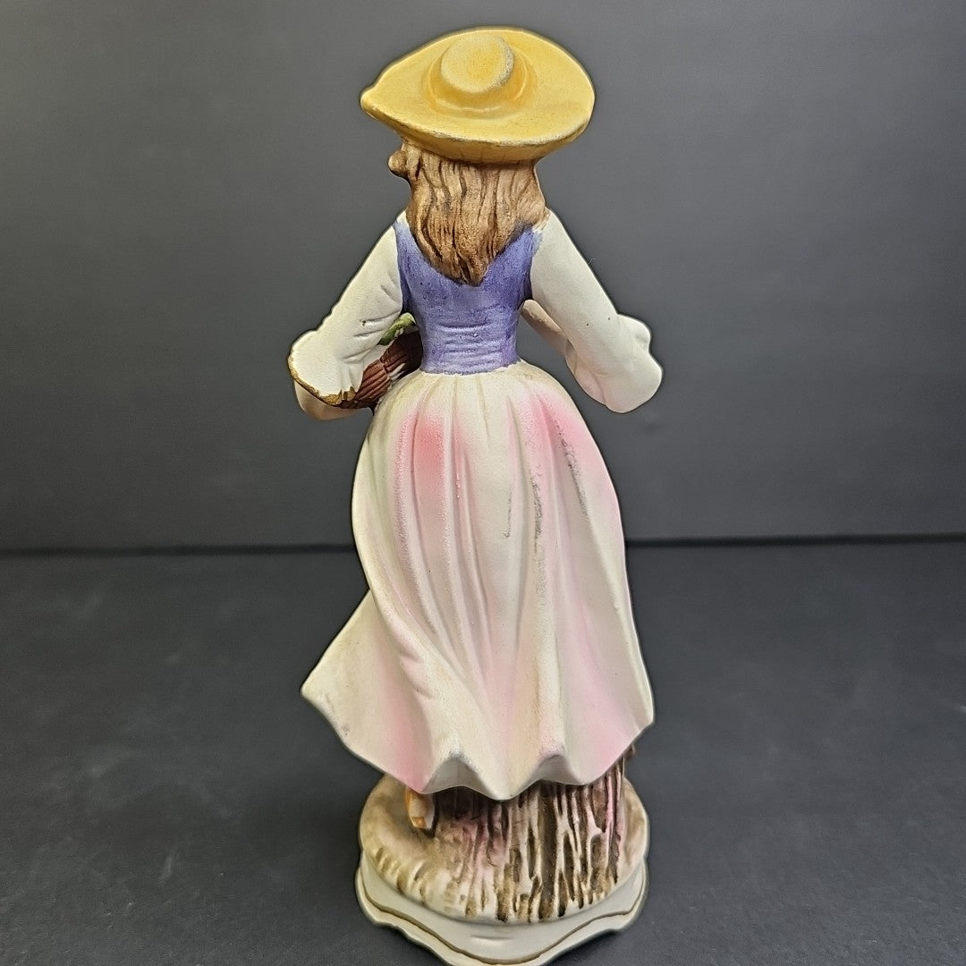 Porcelain Figure of Lady with Basket of Grapes 7"
