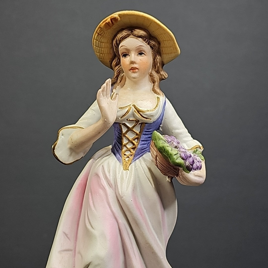 Porcelain Figure of Lady with Basket of Grapes 7"