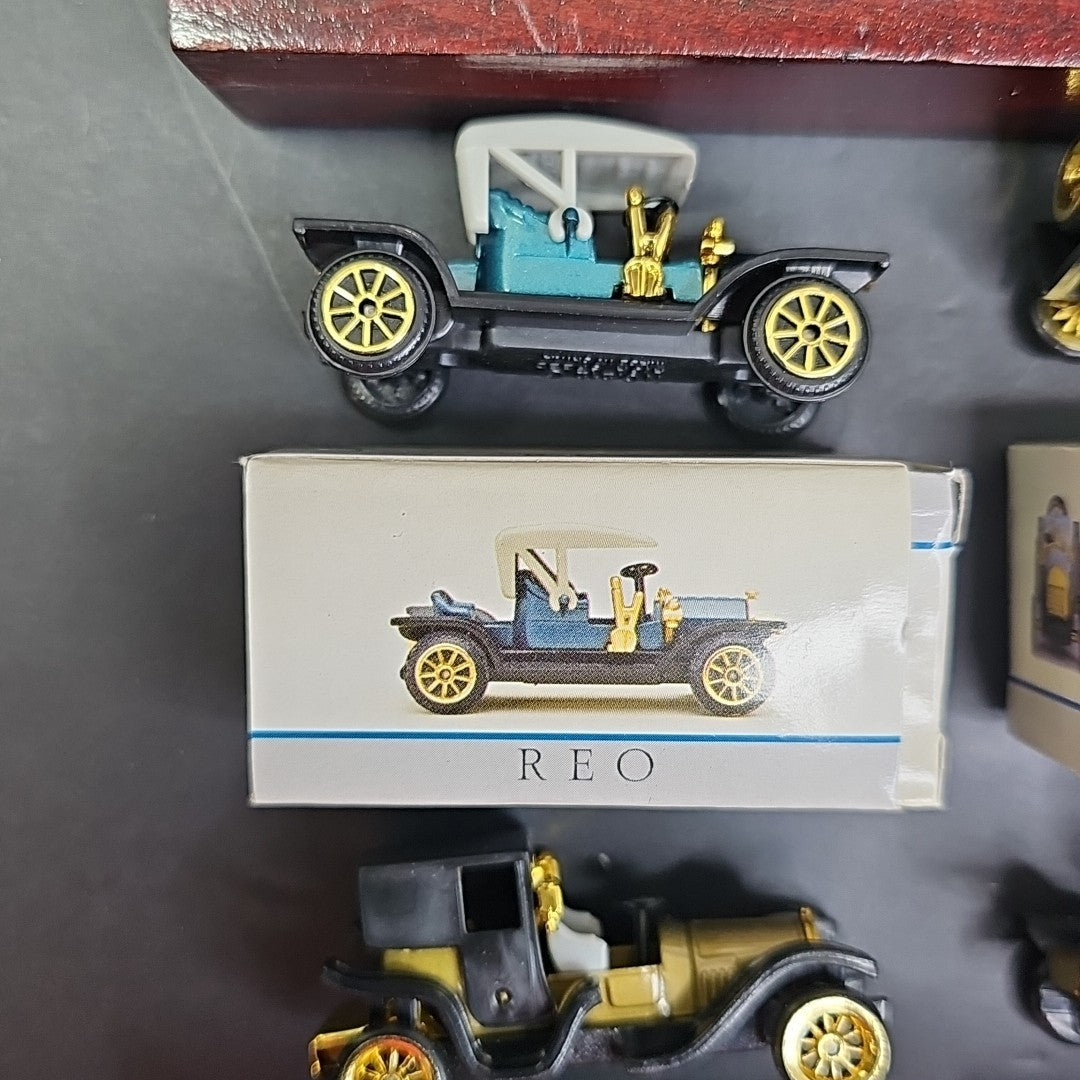 Readers Digest Collectible Miniature Cars - Display with 4 Cars