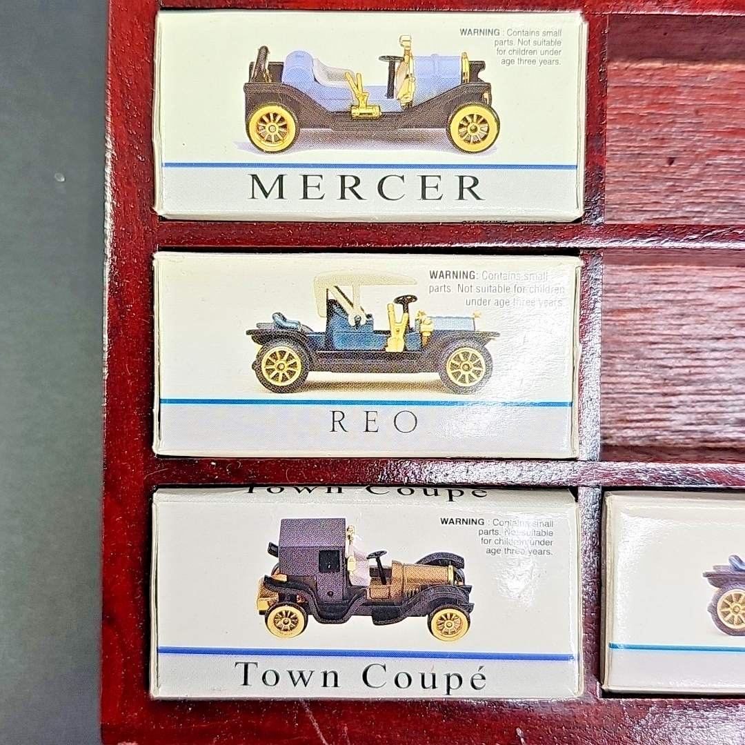 Readers Digest Collectible Miniature Cars - Display with 4 Cars